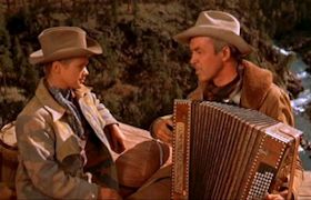 Jimmy Stewart in "Night Passage" with accordion dubbed by Carl Fortina
