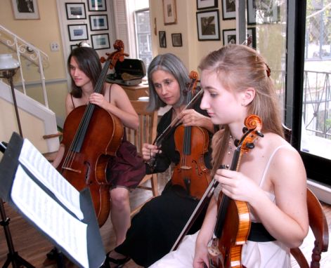 Constance coaches a string chamber group in her Beverly Hills violin studio. 2 violins + 1 cello = beautiful music!
